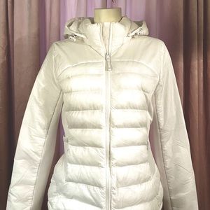 CK looks good on you!! Enjoy this lightweight style of a puffer by Calvin K
